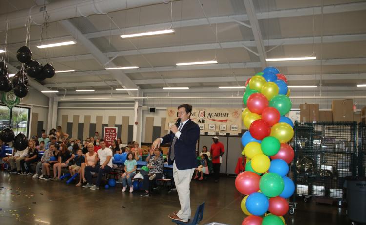 Belmont Academy principal Ron Barker addresses parents and students at the school’s back to school bash. (TONY BRITT/Lake City Reporter)