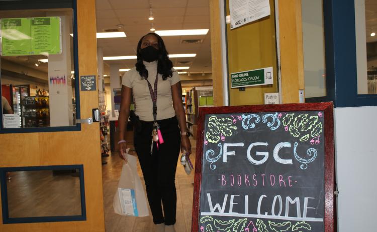 Mariah Carson, who is enrolled at Florida Gateway College for Fall 2021 courses as a criminal justice major, leaves the school bookstore with educational supplies on Monday afternoon. (TONY BRITT/Lake City Reporter)