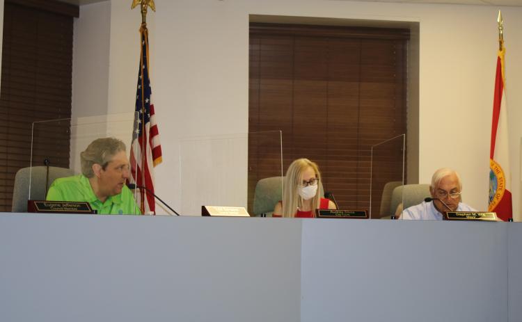 City Council Member Todd Sampson (left) discusses an item at Monday’s budget workshop. (TONY BRITT/Lake City Reporter)