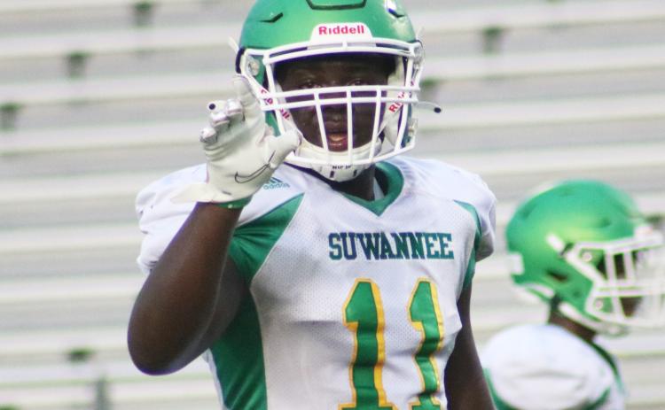 Suwannee linebacker Andrew Brown calls out a play to his defense during a team scrimmage on Saturday. (JAMIE WACHTER/Lake City Reporter)