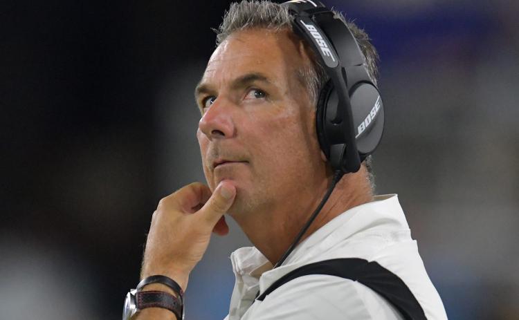 Jacksonville Jaguars head coach Urban Meyer looks at the scoreboard during a preseason game against the Cleveland Brown at TIAA Bank Field on Aug. 14 in Jacksonville. (TRIBUNE NEWS SERVICE)