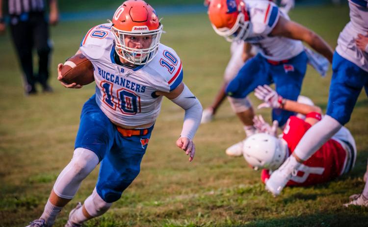 Branford quarterback Kyson Johnson scrambles up the field against Williston on Aug. 27. (BRIAN LEWIS/Special to the Reporter)