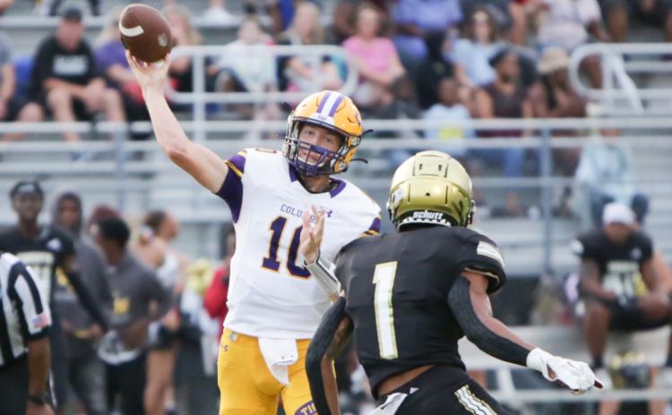 Columbia quarterback Kade Jackson throws a pass against Oakleaf on Sept. 10. (BRENT KUYKENDALL/Lake City Reporter)