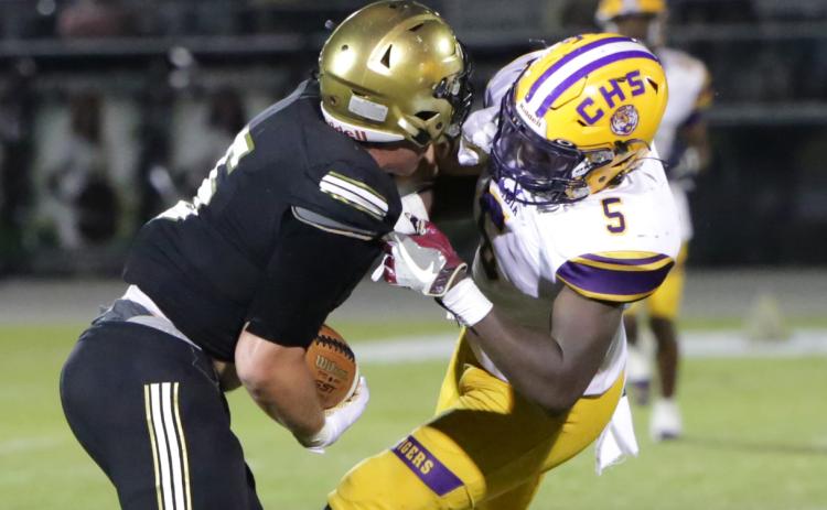 Columbia linebacker Jaden Robinson makes a tackle against Oakleaf on Sept. 10. (BRENT KUYKENDALL/Lake City Reporter)