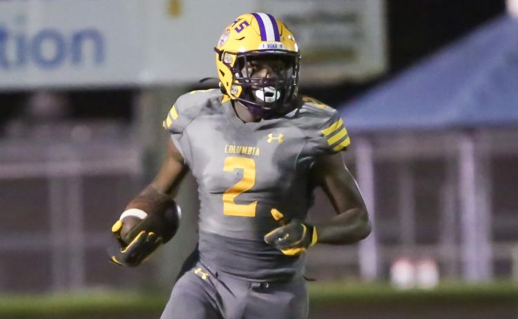 Columbia receiver Marcus Peterson runs up the field after a catch against Englewood on Sept. 17. (BRENT KUYKENDALL/Lake City Reporter)