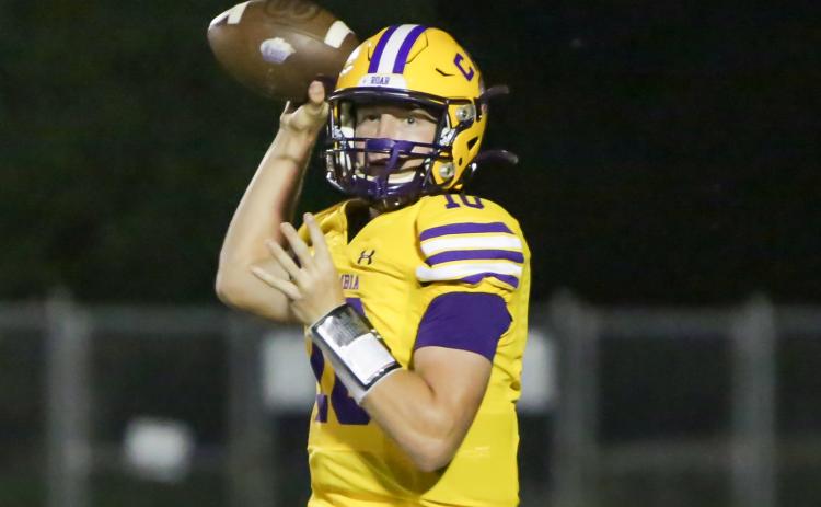 Columbia quarterback Kade Jackson drops back to pass against Trinity Christian on Sept. 24 (BRENT KUYKENDALL/Lake City Reporter)