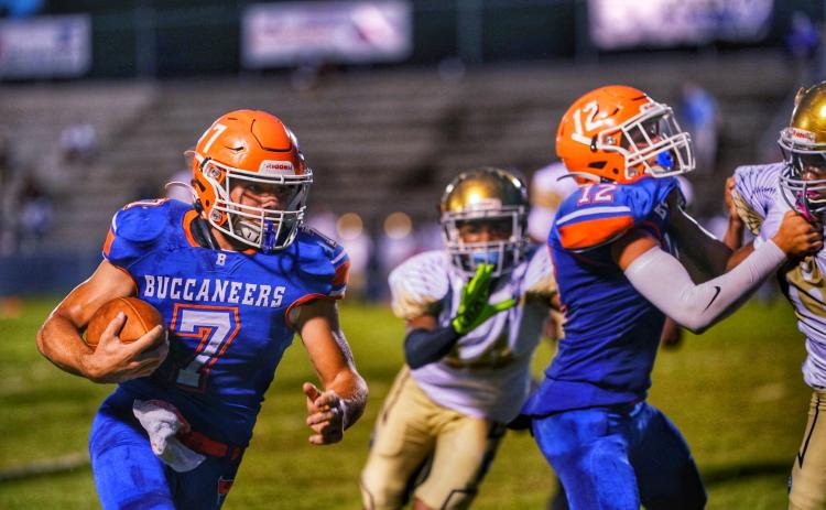 Branford running back Bodhi White takes a carry up the field against Zarephath Academy on Friday night. (BRIAN LEWIS/Special to the Reporter)