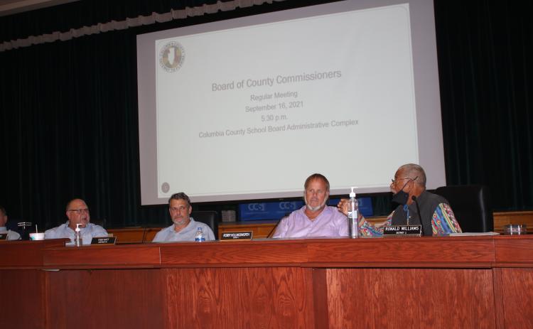 Columbia County Commissioner Ron Williams (right) engages in a shouting match with Commission Chairman Rocky Ford (left) during Thursday’s meeting. (TONY BRITT/Lake City Reporter)