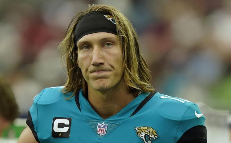 Jacksonville Jaguars quarterback Trevor Lawrence stands on the sidelines during a game against the Houston Texans on Sept. 12 in Houston. The Texans won 37-21. (ERIC CHRISTIAN SMITH/Associated Press)
