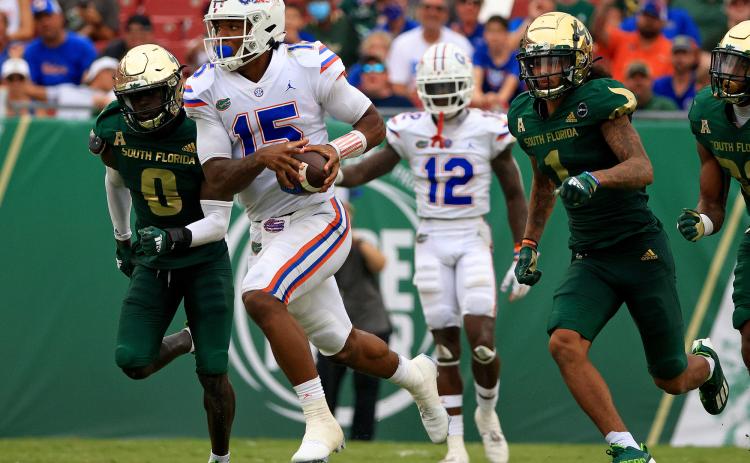 Florida Gators quarterback Anthony Richardson rushes for a touchdown against the South Florida Bulls at Raymond James Stadium on Sept. 11 in Tampa. (MIKE EHRMANN/Getty Images/TNS)
