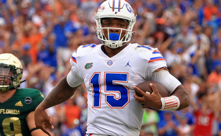 Florida Gators quarterback Anthony Richardson (15) rushes for a fourth-quarter touchdown against South Florida at Raymond James Stadium on Sept. 11 in Tampa. (MIKE EHRMANN/Getty Images/TNS)