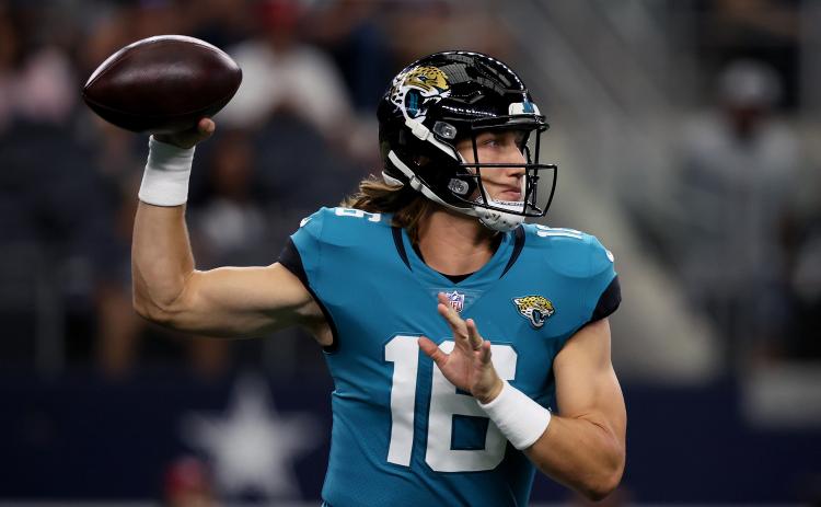 Jacksonville Jaguars quarterback Trevor Lawrence (16) looks for an open receiver against the Dallas Cowboys during a preseason game at AT&T Stadium on Aug. 29 in Arlington, Texas. (TOM PENNINGTON/Getty Images/TNS)