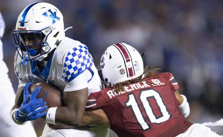 South Carolina defensive back R.J. Roderick (10) tackles Kentucky running back Kavosiey Smoke at Williams-Brice Stadium on Sept. 25 in Columbia, S.C. (HAKIM WRIGHT SR./Associated Press)
