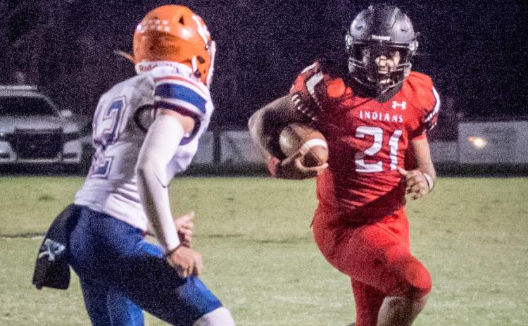 Fort White running back Lecosta Byrd rushes up the field against Branford on Sept. 24. (CHRISTINA FEAGIN/Special to the Reporter)
