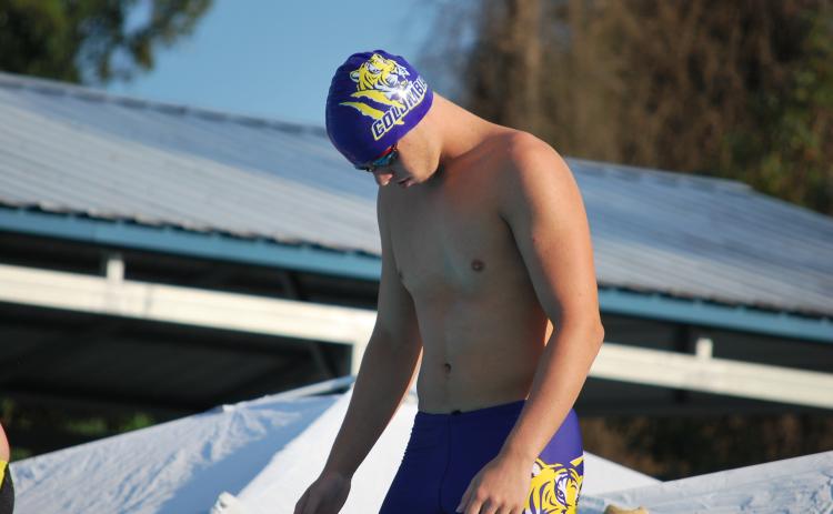 Columbia swimmer Jayden Drew gets ready on the block prior to swimming the 50 freestyle against Yulee on Tuesday. (COURTESY)