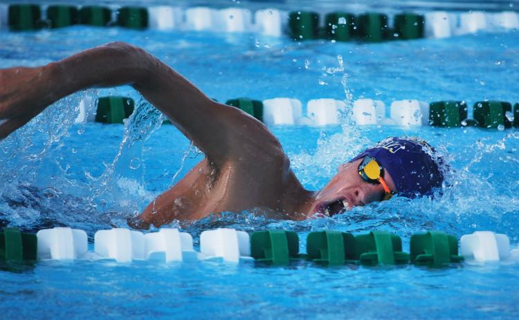 Columbia swimmer Matt Glover competes in the 500 freestyle during Tuesday’s meet against Suwannee. (COURTESY)