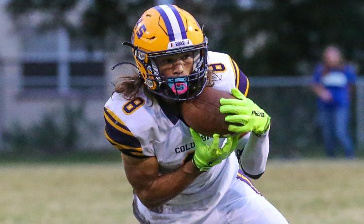 Columbia receiver Jace Hoskey pulls in a catch against Riverside on Oct. 8. (GARY LLOYD MCCULLOUGH/Special to the Reporter)