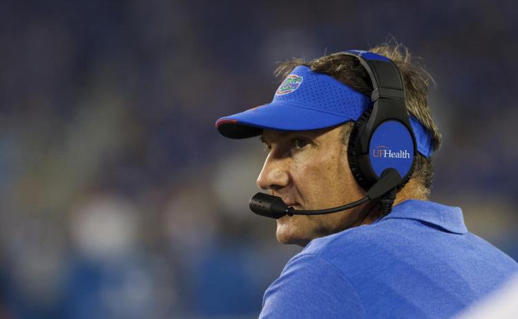 Florida head coach Dan Mullen looks up at the videoboard during a game against Kentucky on Oct. 2 in Lexington, Ky. (MICHAEL CLUBB/Associated Press)