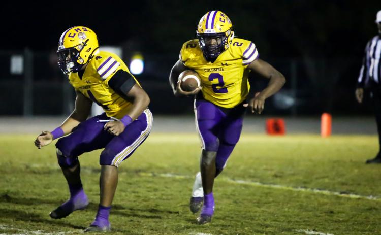 Columbia receiver Marcus Peterson rushes up the field against Riverside during Friday’s Region 1-6A quarterfinal. (BRENT KUYKENDALL/Lake City Reporter)