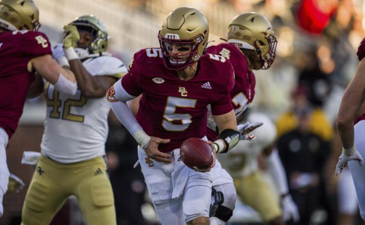 Boston College quarterback Phil Jurkovec (5) drops back to hand the ball off against Georgia Tech on Nov. 13 in Atlanta. (DANNY KARNIK/Associated Press)