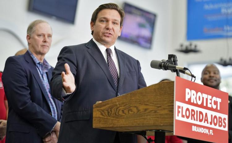 Ron DeSantis speaks to supporters and members of the media after a bill signing Thursday in Brandon. (CHRIS O’MEARA/Associated Press)
