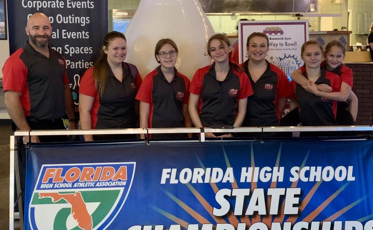 Fort White’s state bowling team: head coach Steven Hill, Alyssa Marlowe, Khloe Schmidt, Stephanie Selman, Alexis Wooley, Shelbie Wagner and Reagan Falotico. (COURTESY)