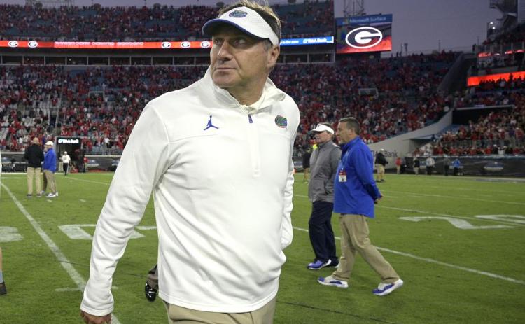 Florida head coach Dan Mullen walks off the field after a loss to Georgia on Oct. 30 in Jacksonville. (PHELAN M. EBENHACK/Associated Press)