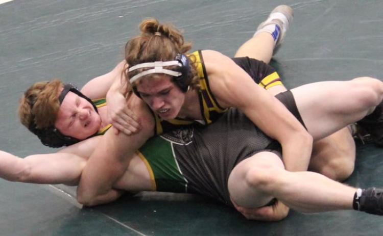 Columbia wrestler Joseph Rice grapples with an opponent last season. Rice was a state qualifier in his junior year. (COURTESY)