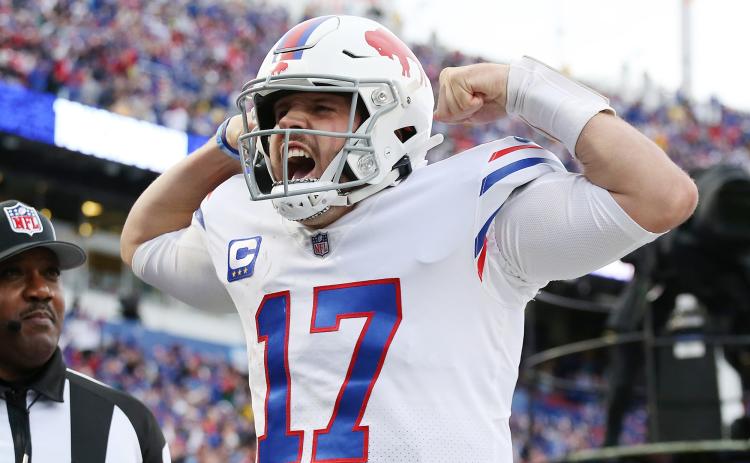 Buffalo Bills quarterback celebrates after scoring a touchdown against the Miami Dolphins at Highmark Stadium on Oct. 31 in Orchard Park, N.Y. (JOSHUA BESSEX/Getty Images/TNS)