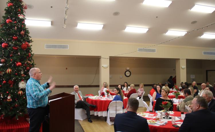Columbia Senior Services Director David Huckabee addresses the crowd at the United Way luncheon. (TONY BRITT/Lake City Reporter)