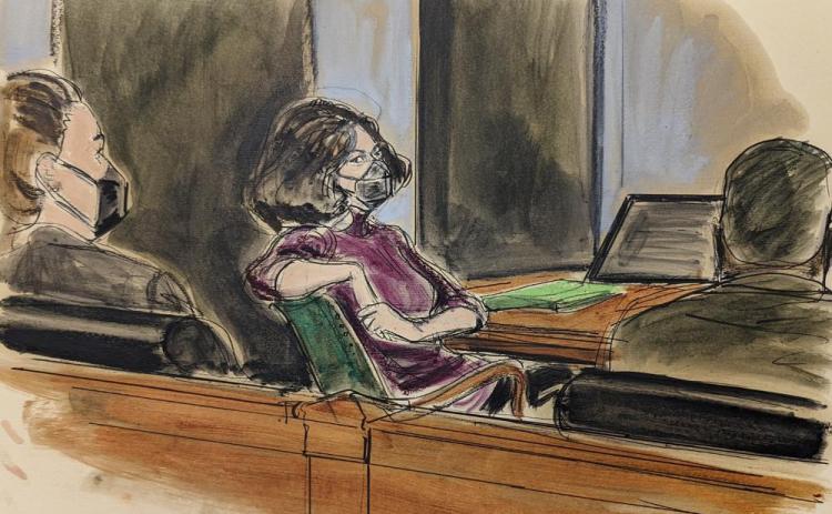 In this courtroom sketch, Ghislaine Maxwell, center, sits in the courtroom during a discussion about a note from the jury, during her sex trafficking trial, Wednesday, Dec. 29, 2021, in New York. (ELIZABETH WILLIAMS/Associated Press)