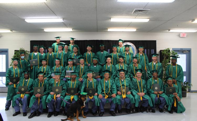 The 37 graduates from the FDC’s Second Chance Pell program display their diplomas from Florida Gateway College on Dec. 15. (COURTESY)