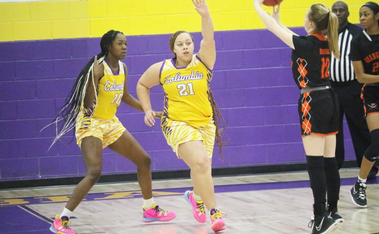 Columbia forward Amaiya Callum contests a shot against Orange Park on Jan. 13. (JORDAN KROEGER/Lake City Reporter)
