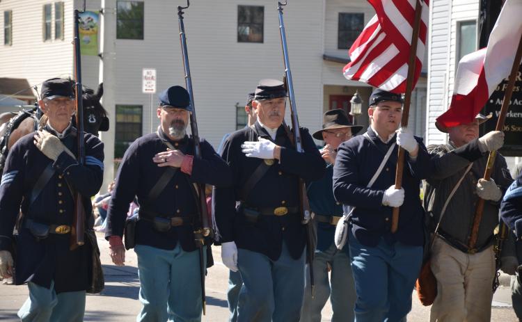 A group of Union soldiers marches past the spectators during the Olustee Festival parade in 2020. The Blue-Grey Army is not contributing to the Olustee Battle Reenactment this year and a lack of funding could mean the festival is on its last legs as well. (FILE)