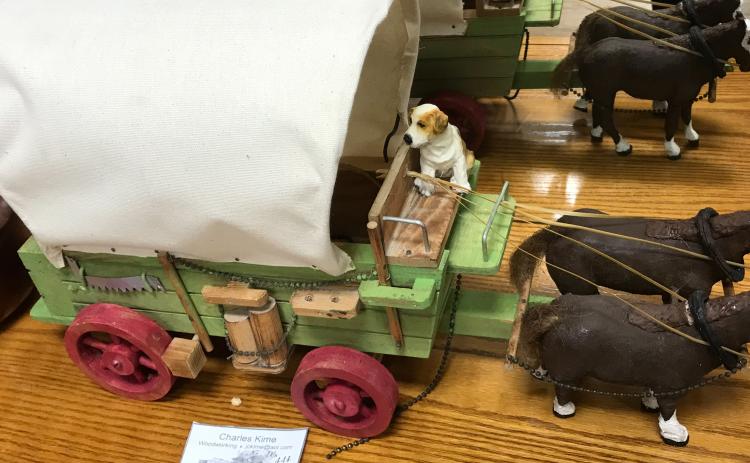 A conestoga wagon wood carving by Charles Kime, who will be offering woodcarving classes at the Gateway Art Gallery, beginning in February. (COURTESY)
