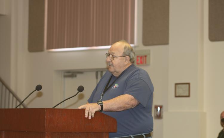 Lake City Humane Society’s adoption counselor Roy Armstrong speaks during Thursday morning’s meeting. (JAMIE WACHTER/Lake City Reporter)