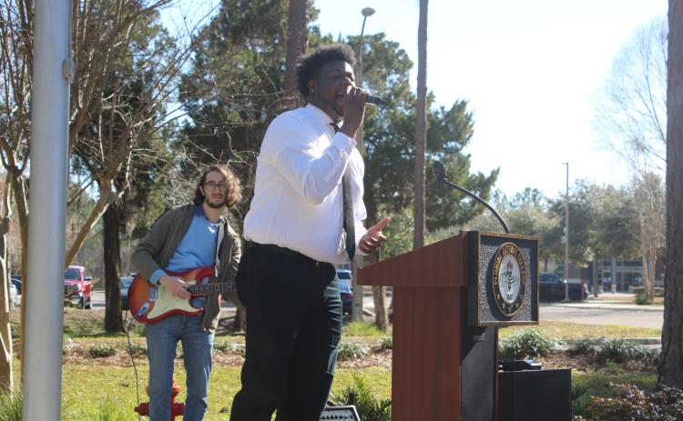 Kipp Walker (right) sings Marvin Gaye’s ‘What’s Going On’ while accompanied by Todd Siff on the electric guitar at Florida Gateway College on Tuesday morning. The two performed at the FGC Black History Month kickoff ceremony. (TONY BRITT/Lake City Reporter)