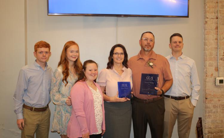 Dalton Thomas (from left), Darbie Thomas, Melanie Thomas, Jan Thomas, Darryl Thomas and DJ Thomas, pose for a photograph after Darryl Thomas was named the 2023 Columbia County Teacher of the Year. (TONY BRITT/Lake City Reporter)