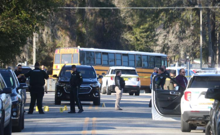 Law enforcement investigates a shooting incident on SW Winter Way near Lake City Middle School on Feb. 14. (FILE)