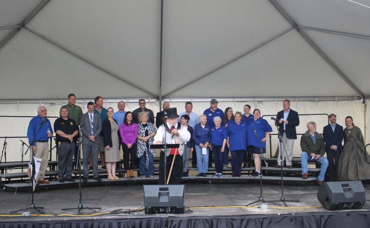 Tony Buzzella (center), commanding general of the Blue-Grey Army, starts off the Olustee Festival with some opening remarks Friday. (TONY BRITT/Lake City Reporter)