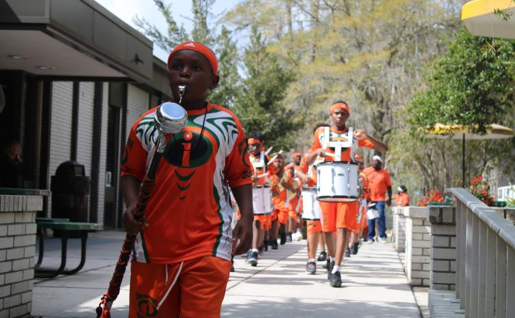 The ICON Preparatory School Marching Rattlers performed Wednesday at Florida Gateway College’s Black History Month program. (TONY BRITT/Lake City Reporter)