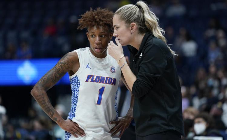 Florida head coach Kelly Rae Finley talks with Kiara Smith during a game against Vanderbilt at the women's Southeastern Conference tournament on March 3 in Nashville, Tenn. (MARK HUMPHREY/Associated Press)