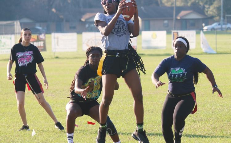 Columbia’s Na’Haviya Paxton catches a pass during Wednesday’s practice. (JORDAN KROEGER/Lake City Reporter)