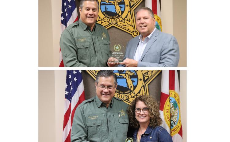 Senators Chuck Brannon (above) and Jennifer Bradley pose with Columbia County Sheriff Mark Hunter as he presents them with a “Friend of the Sheriff” award on Friday. (COURTESY PHOTOS)
