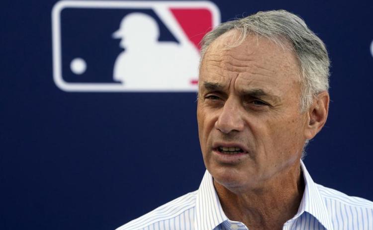 Major League Baseball Commissioner Rob Manfred speaks during a news conference after negotiations with the players' association toward a labor deal on Tuesday at Roger Dean Stadium in Jupiter (WILFREDO LEE/Associated Press)