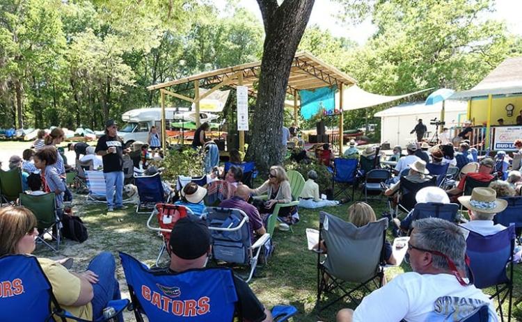 Local songwriters, musicians and music enthusiasts gather during a previous Santa Fe River Song Contest. (COURTESY)