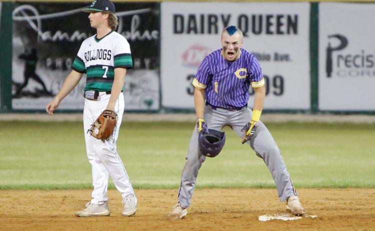 Columbia’s Hayden Gustavson celebrates after hitting a double against Suwannee on Tuesday night. The game was called in the third inning due to rain with the Tigers leading 1-0. A makeup date is to be determined. (BRENT KUYKENDALL/Lake City Reporter)
