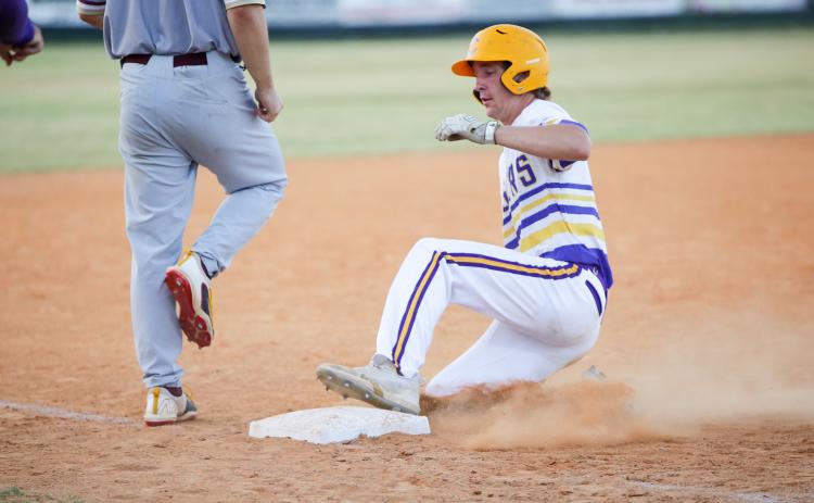 Columbia outfielder Kade Jackson slides safely into third base during Monday’s game against St. Augustine. (BRENT KUYKENDALL/Lake City Reporter)