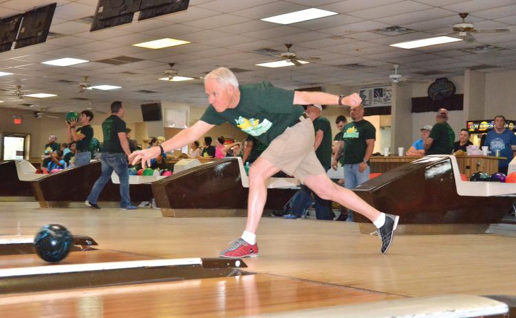 Bill Frye, the president of the Florida Sheriffs Youth Ranches, takes his turn during the 2018 Fins and Pins event at Lake City Bowl. (FILE)