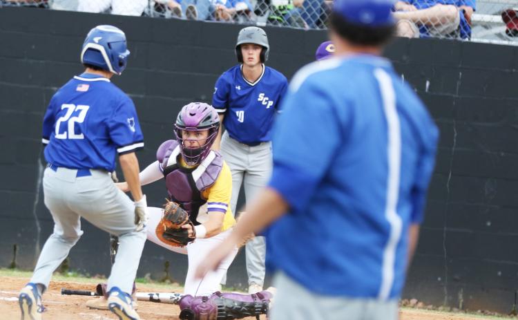Columbia catcher Hayden Gustavson tags out Stanton’s Anderson Eller on Friday night. (MORGAN MCMULLEN/Lake City Reporter)